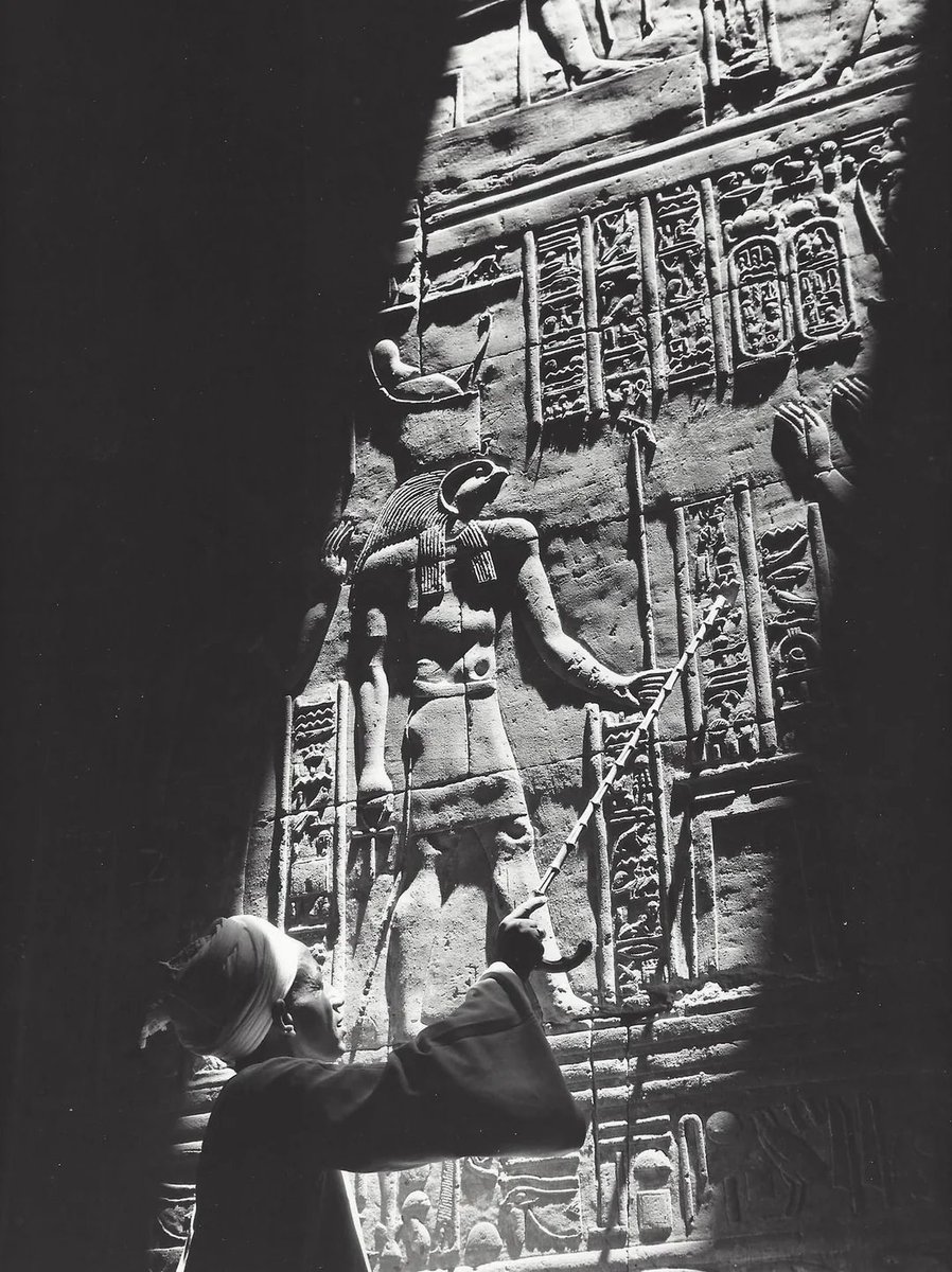 Light and shadow on a relief in an Egyptian temple. 1968 photo by Kees Scherer.