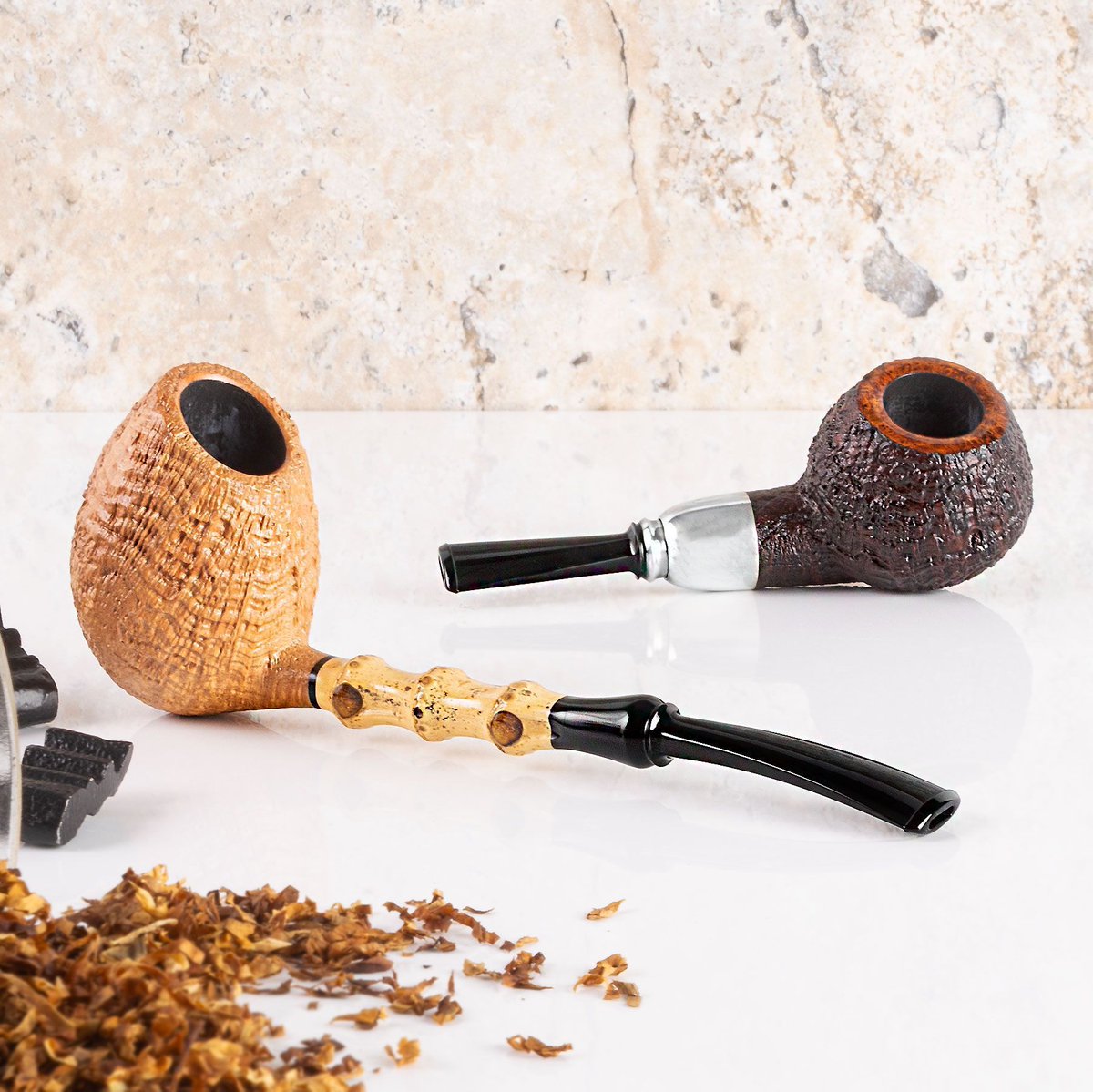 American artisan Abe Herbaugh presents two new pipes that highlight his Danish-inspired aesthetic: a sandblasted Apple fitted with a sterling silver spigot, and a sandblasted bent Egg.
Shop Now: smokingpip.es/Herbaugh

#SmokingPipes #PipeSmokers #PipeCommunity #ArtisanPipes