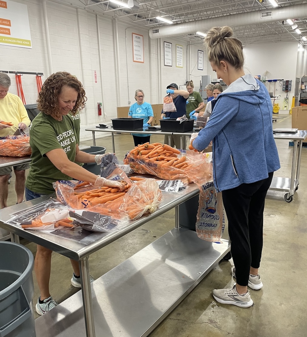 Thank you to the Food Bank Of Iowa for a fulfilling afternoon! Blue Compass team members spent time sorting, weighing and packing various food items for distribution to food pantries and programs across Iowa. We packed 7,710 lbs of carrots—the most for a group our size!