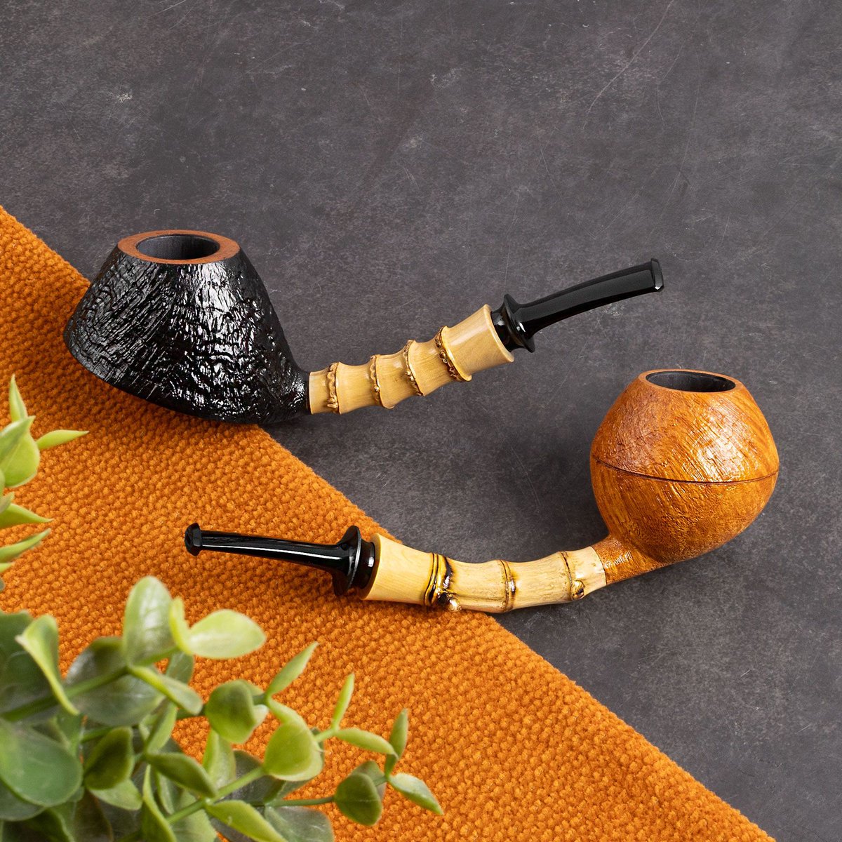 Remarkable accents unite two new sandblasted pipes from Jerry Zenn: a classic Rhodesian adorned with bamboo and boxwood, and a sculptural Volcano with the same striking combination.
Shop Now: smokingpip.es/Zenn

#SmokingPipes #PipeSmokers #PipeCommunity #PipeCollector