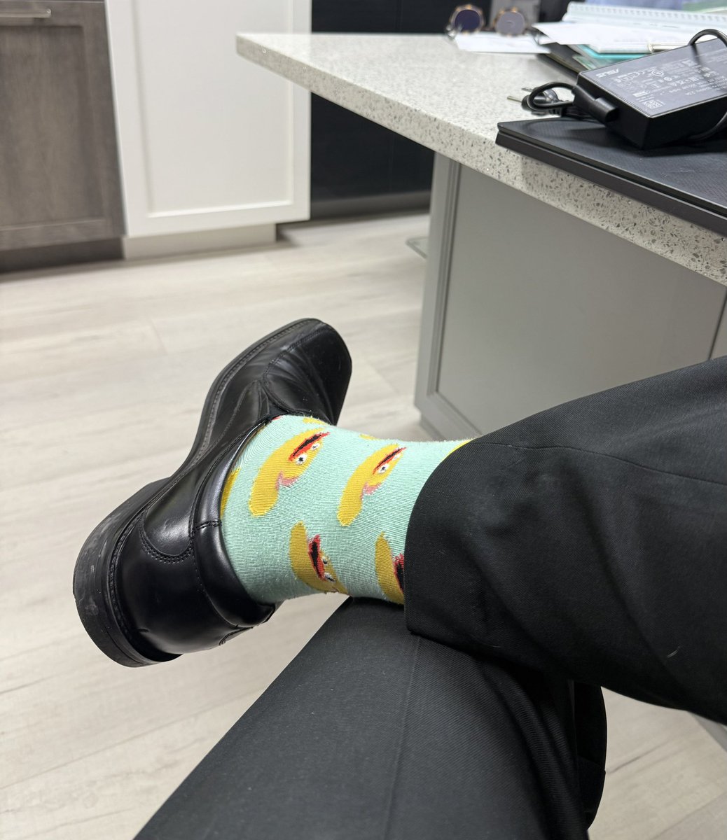 Establish dominance in a business meeting by flashing the Rubber Duckey socks