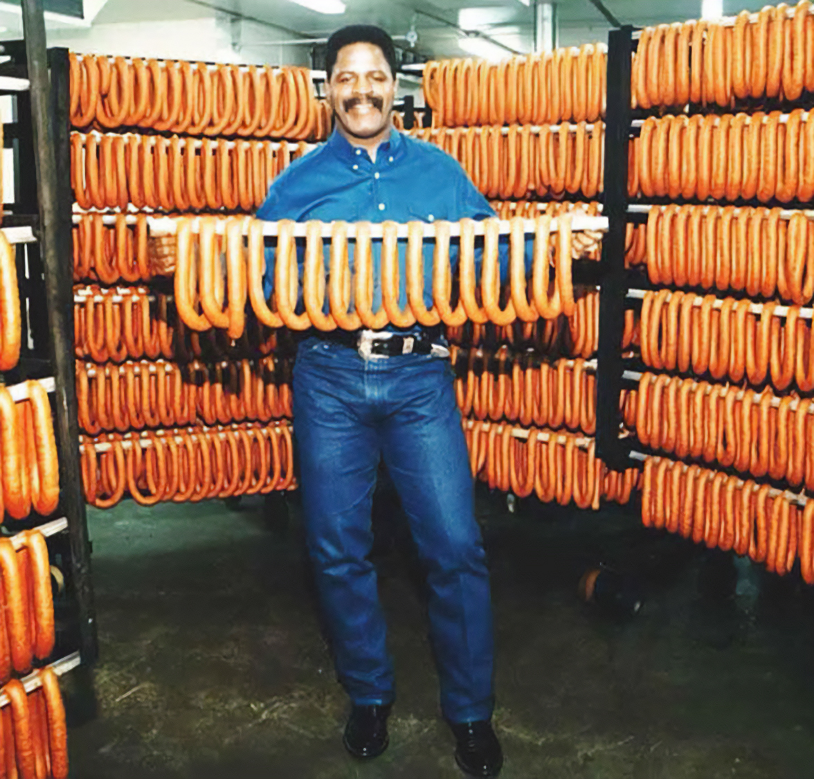 TracesofTexas's tweet photo. I reached "peak Texas" earlier this afternoon. I went to @HEB ,  got myself some Earl Campbell hot links, put 'em on the grill, wrapped them in tortillas, and washed them down with some Big Red.

Shown here: Earl with some of his sausage circa 1991. https://t.co/nHvLQaH7CB