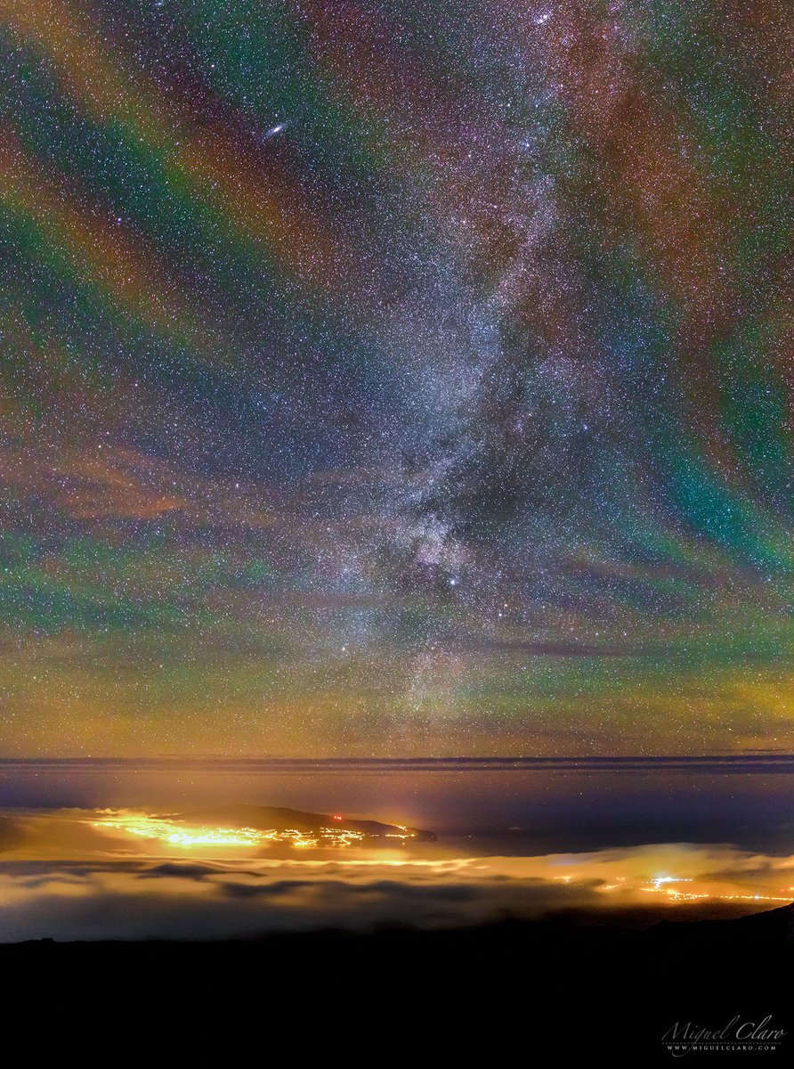Why would the sky glow like a giant repeating rainbow? Airglow. Now, air glows all of the time, but it is usually hard to see. A disturbance however -- like an approaching storm -- may cause noticeable rippling in the Earth's atmosphere. These gravity waves are oscillations in