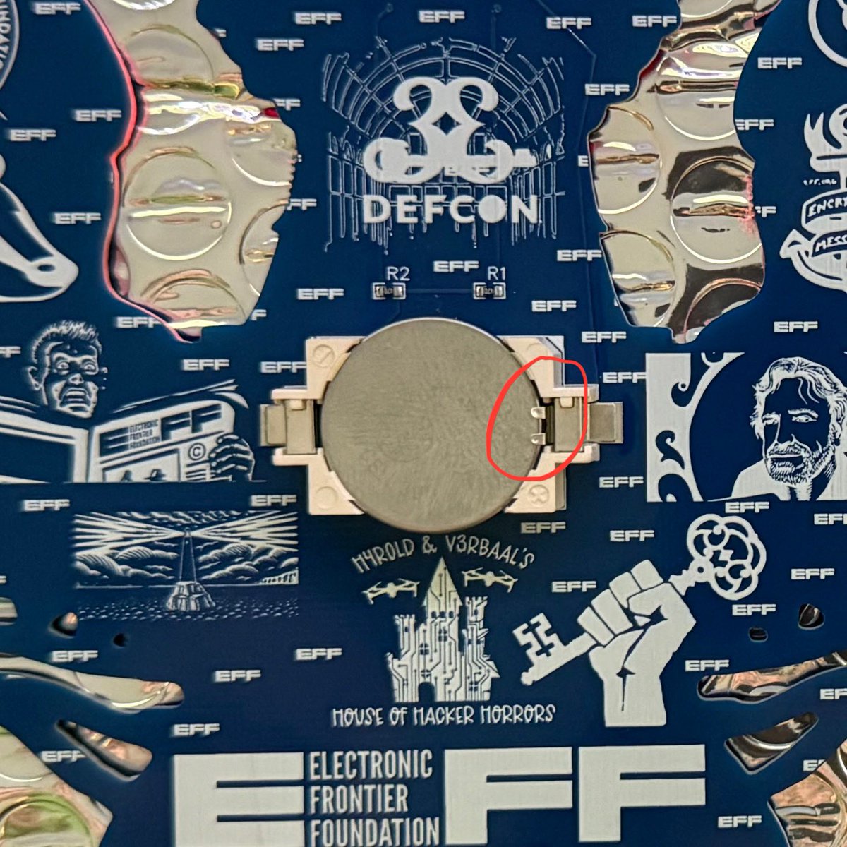 v3rbaal's tweet image. PSA—Don’t get too excited and jam the battery into the EFF badge. Follow the instructions on the slip of paper. Slide the battery under the small prongs.