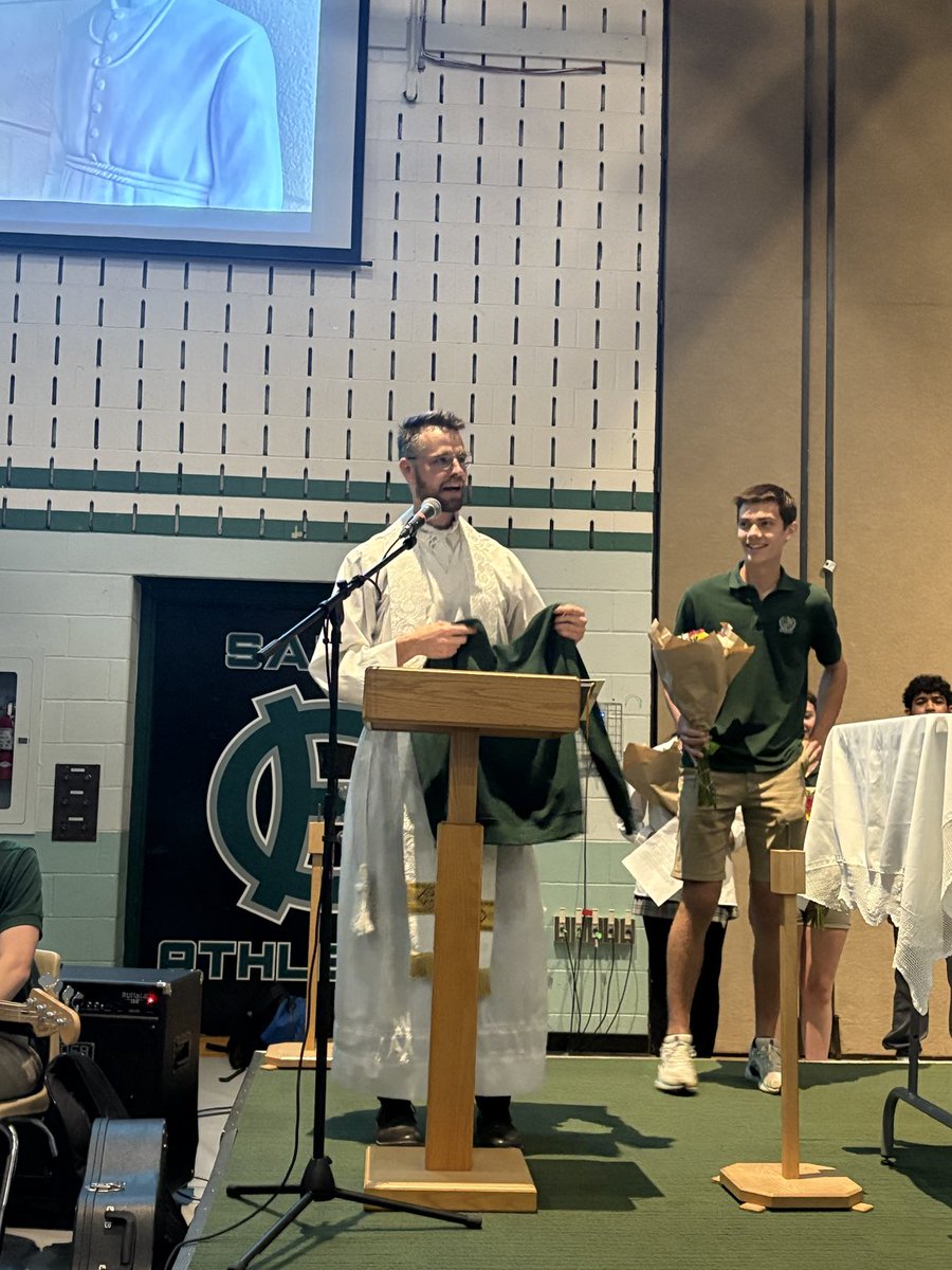 terrianndaniel's tweet image. Thankful for these two departing staff - Fr. Quenneville looks good in HC green after all & Ms. Goodberry told everyone it’s a “see you later.” We hope so, Ms. G, but in the meantime all the best at RND!