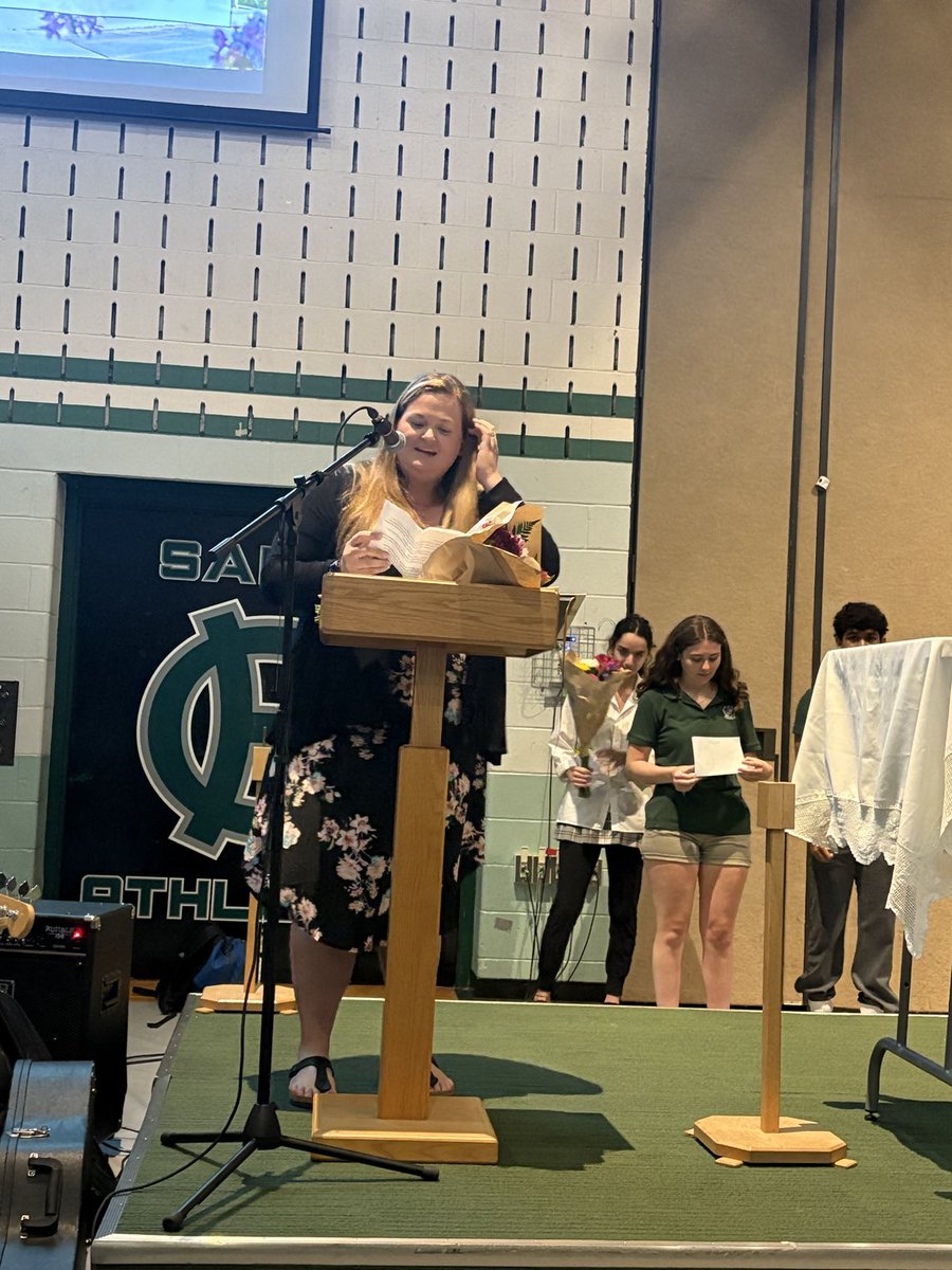 terrianndaniel's tweet image. Thankful for these two departing staff - Fr. Quenneville looks good in HC green after all & Ms. Goodberry told everyone it’s a “see you later.” We hope so, Ms. G, but in the meantime all the best at RND!
