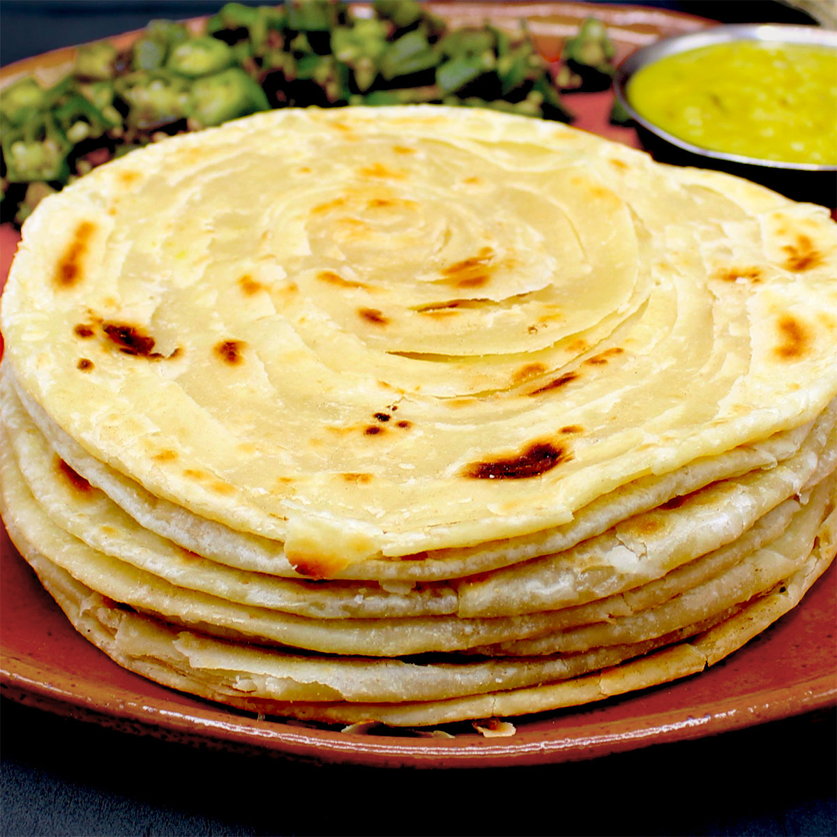 My recipe for Indian restaurant style paratha with countless crispy layers that splinter as you tear into the soft center. Use it to scoop up a spicy Indian curry or dal. holycowvegan.net/khasta-paratha…
#paratha #vegan