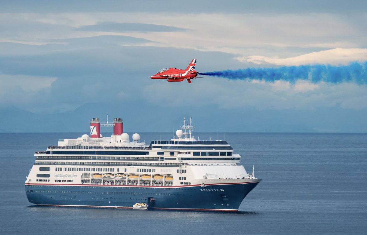 Wonderful to see the RAF Red Arrows Aerobatic Display Team in action over Douglas Bay last night. 
This fantastic image, captured by Chris Kirkham, shows one of the Hawk ‘fast jets’ over Fred Olsen flagship Bolette.