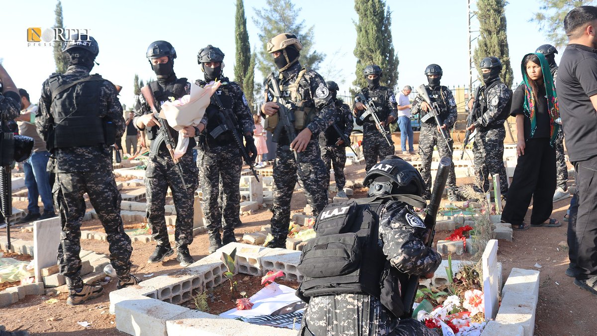 Residents of the city of Kobani in north #Syria visit the tombs of their loved ones on the first day of #Eid_al_Adha.

#Kobani – Fattah Issa - North Press