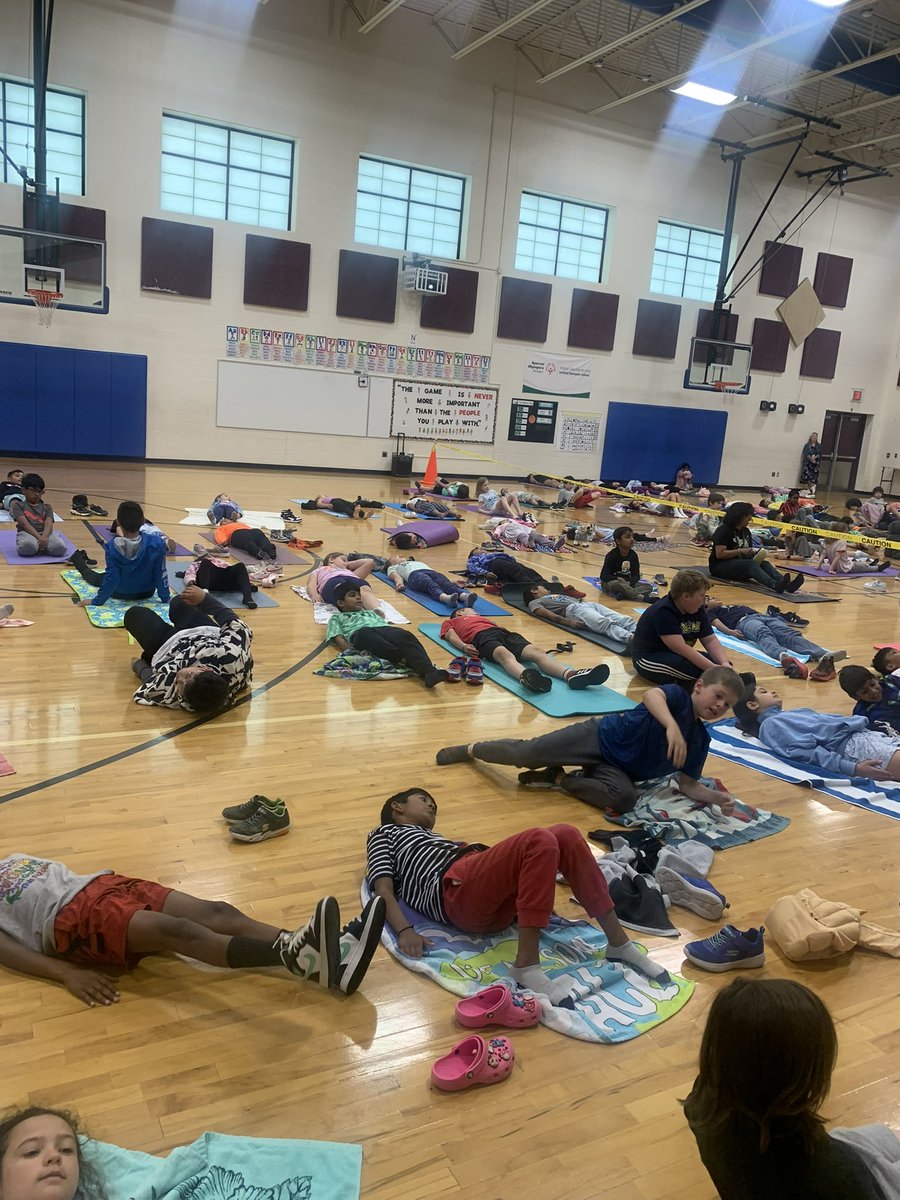 3rd graders enjoyed yoga in the gym together 💚