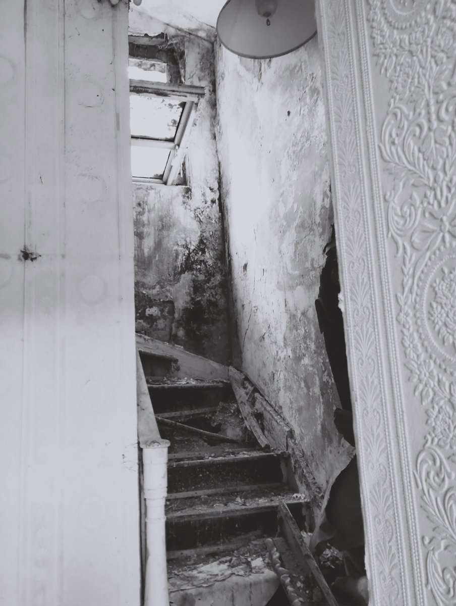 On a street in town there is door open that's not normally open.