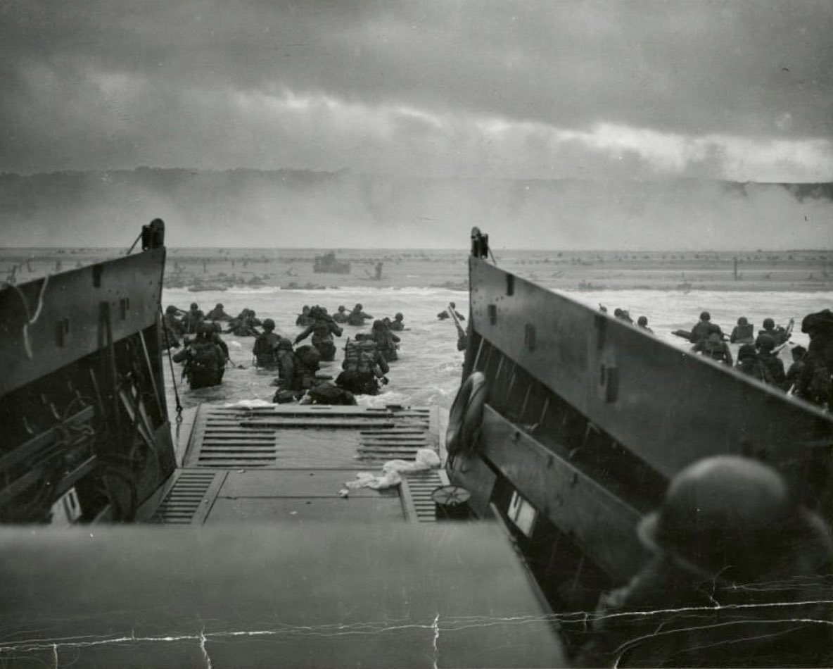 Photo called "Into the Jaws of Death" taken on this day in 1944.

36 men, on the initial storming into the water at Omaha Beach in Normandy.

100 pound backpacks.
Rough seas.
Germans shooting from bluffs on high.

The sacrifice is hard to fathom.

For those that battled, THANK