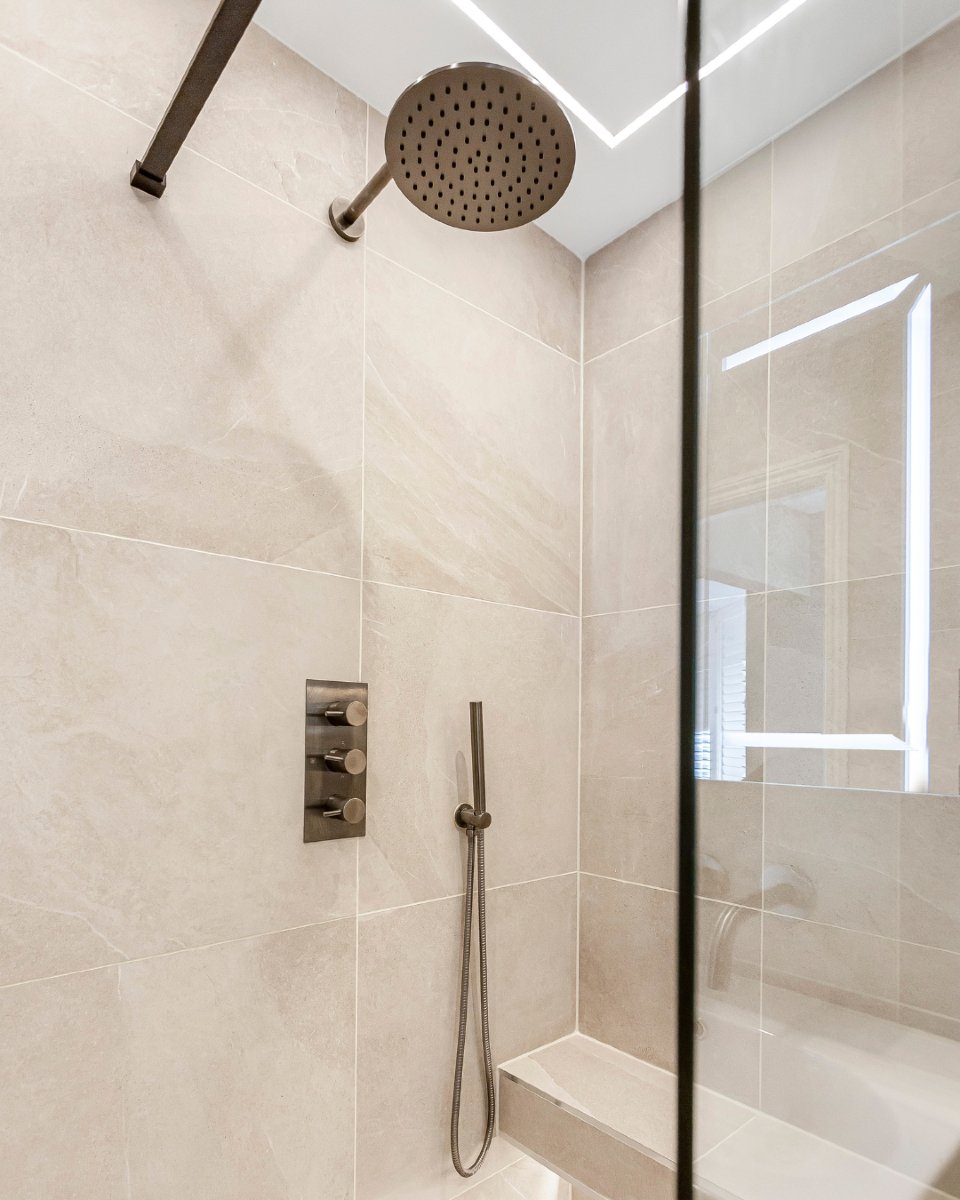 A calming, neutral palette with a warm touch 🪵

A built-in shower seat turns the daily routine into a wellness ritual.
Ready to bring calm luxury to your own home?
bit.ly/bbdprojects

#bathroomsbydesign