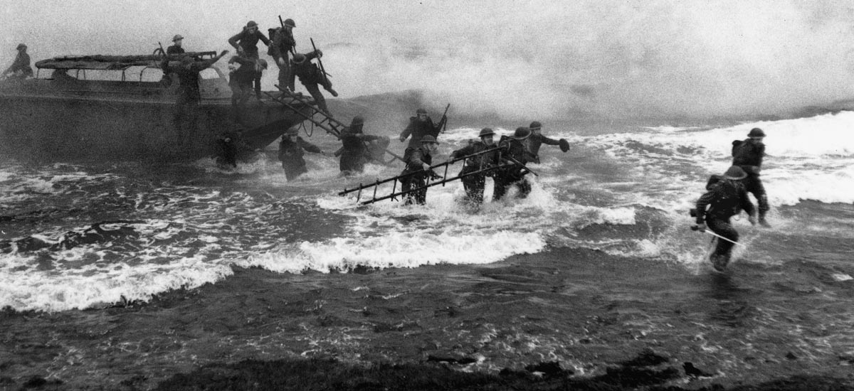 On the far right, "Mad Jack" Churchill storms a beach, sword in hand, during a training exercise. He wielded it in real battles in France, Italy, and elsewhere during the war, as well as a longbow.