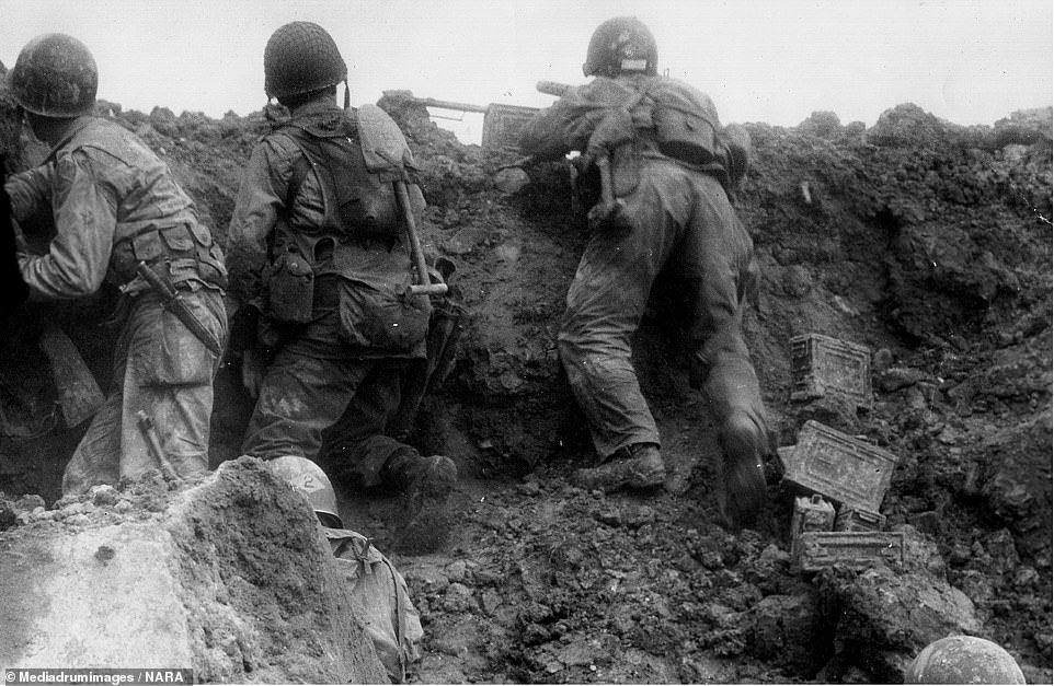 Rangers defending Col Rudder’s CP. One of my favorite photos from Normandy.
-
“One of the few photographs capturing Rangers in combat at Pointe du Hoc. Probably taken on June 7, the image shows an NCO (top right) firing an M1919A4.30-caliber Machine Gun from a fighting position