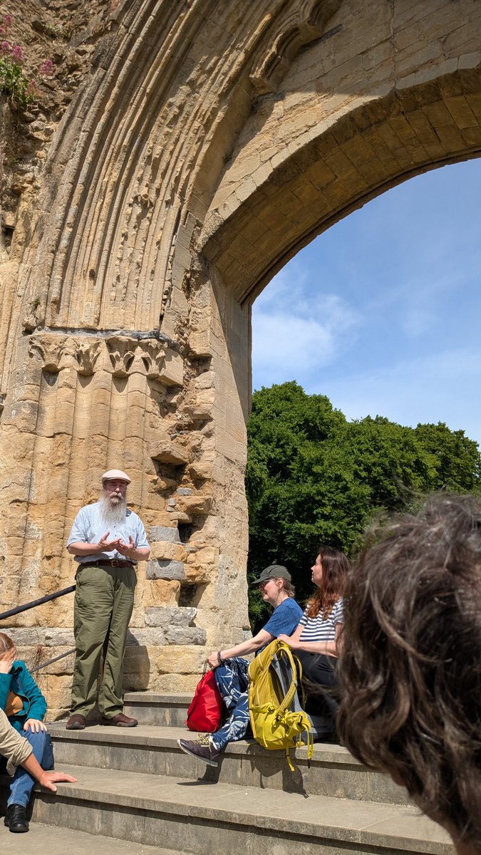 Glastonbury abbey aesthetic.

Archdruid in the shadow talking about sacred geometry.