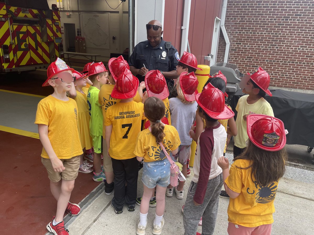 This was an unexpected but special request!!  During a school field trip, students from Shaker Lane School gathered around Officer Abu, asking him to sign autographs! We have just one condition: please don't sell them on eBay! 

This photo was taken at the Littleton Fire Station