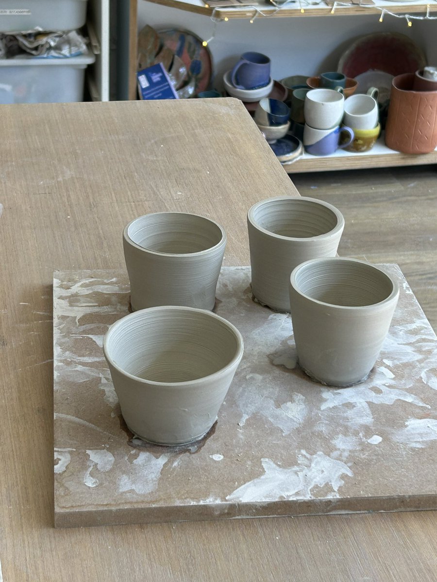 Wheel progress! Mug and tea bowl and a series of tumblers. Trying to throw repeated forms but it’s challenging to get them exact.