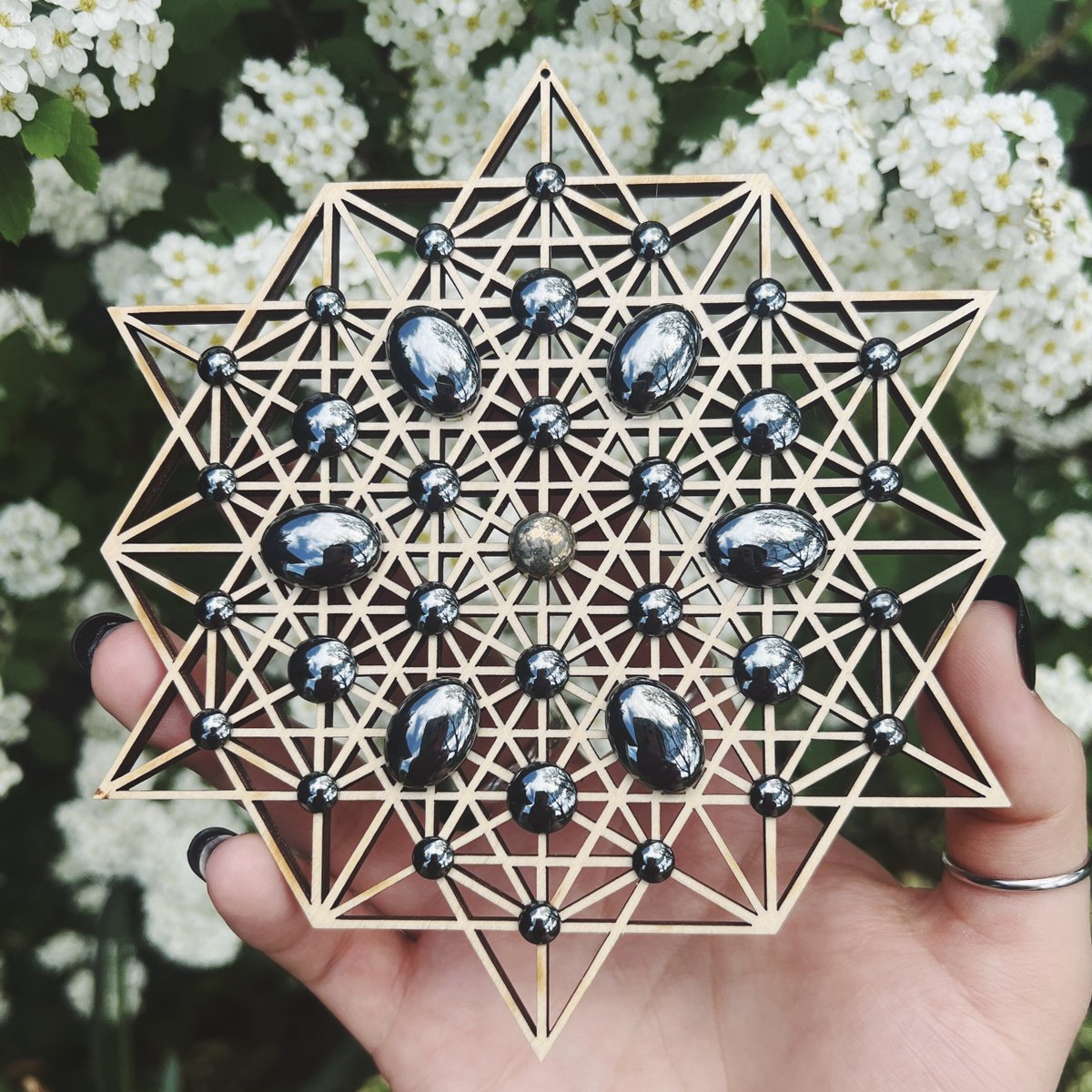 “Alchemist’s Reflection” Crystal Grid 🪞

Built on the 64 tetrahedron, this grid releases stagnant energy and shifts it into fresh flow. Hematite grounds and reflects your goals, while Pyrite’s solar energy boosts manifestation and positive momentum.