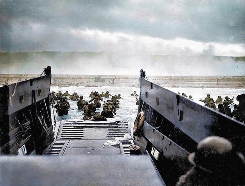 The First Wave (Continued)
-
Already the sea runs red. Even among some of the lightly wounded who jumped into shallow water the hits prove fatal. Knocked down by a bullet in the arm or weakened by fear and shock, they are unable to rise again and are drowned by the onrushing