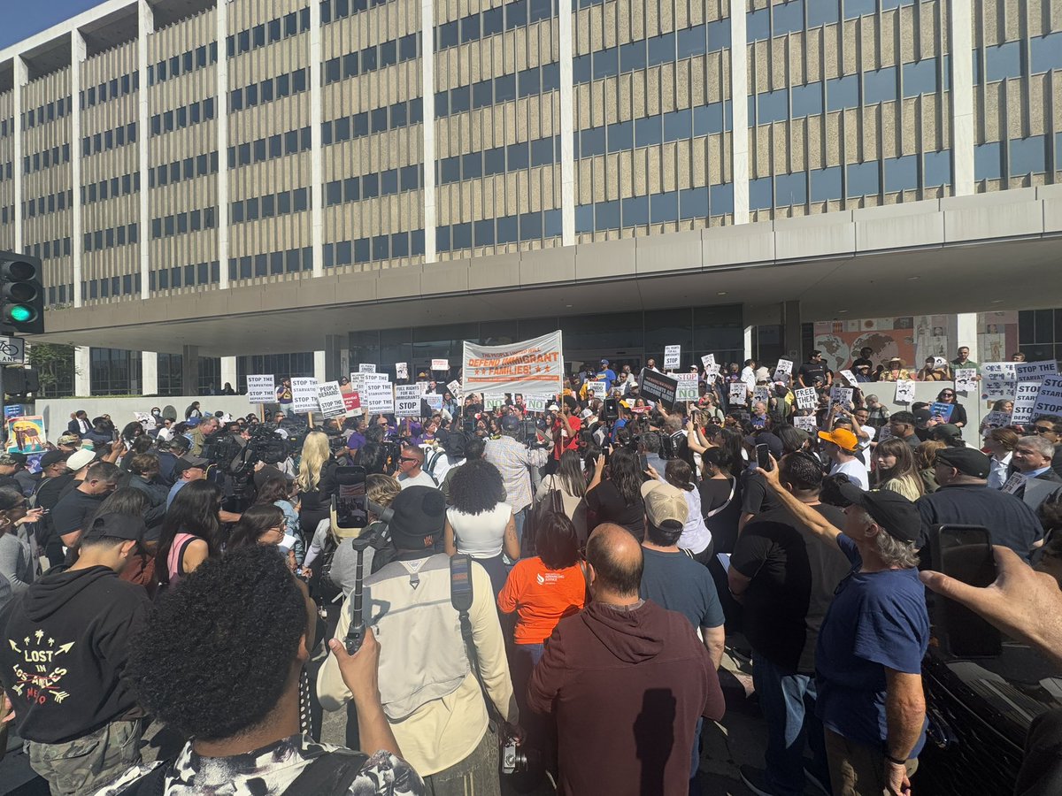 Anti-ICE protest in downtown Los Angeles continues to grow. Several hundred people here.