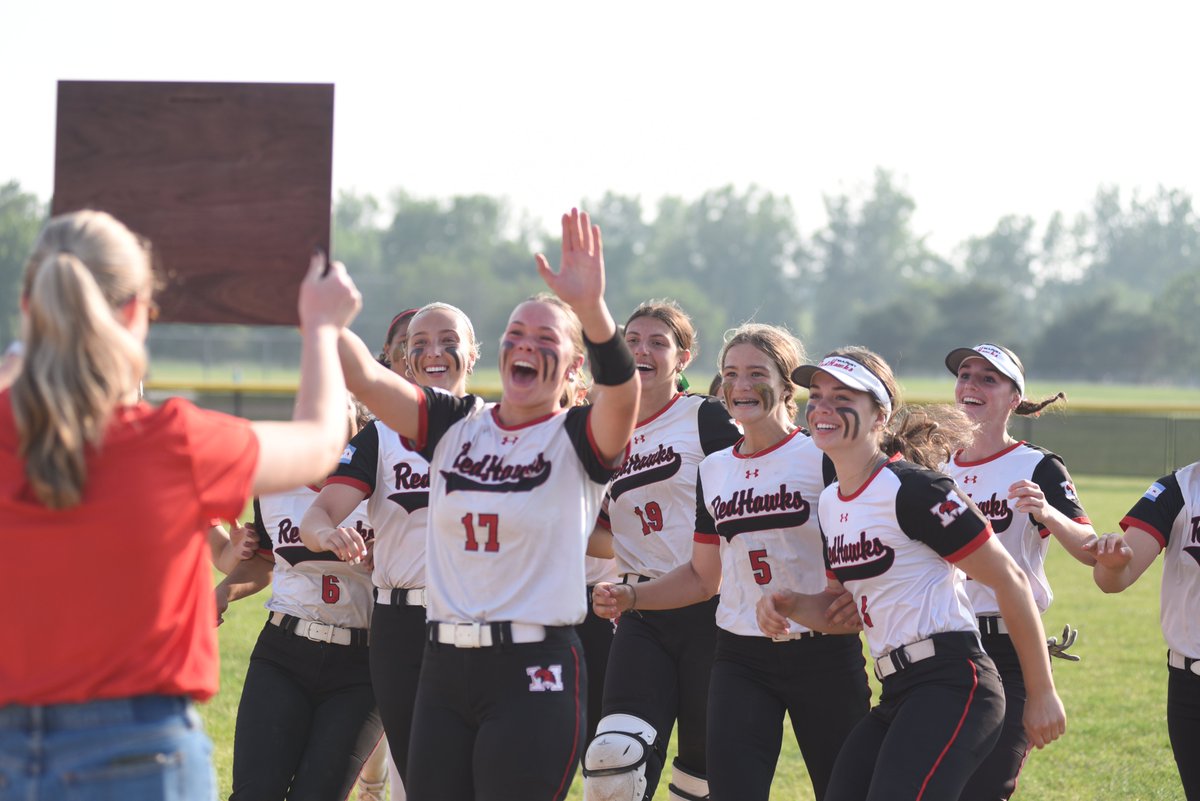 Find someone who looks at you the Marist softball team looks at that Class 4A sectional championship plaque...