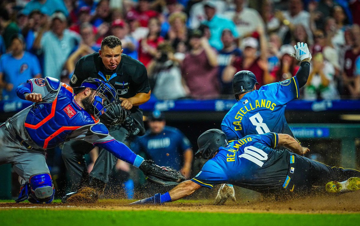 Whoever shot this pic from the Phillies vs Mets game last night, kudos to you. I've been searching the internet to credit the shooter but can't find the name. Sad it is everywhere with no credit. Awesome play and shot.