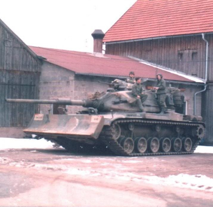 M60A1 RISE with an M9 Dozer in use with US forces in West Germany some time during the winter.