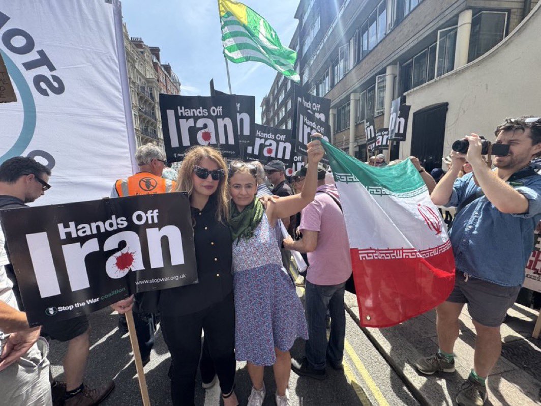 Islamic regime flag, at the march which you said would be both anti-war and anti-IR. Let me be REALLY clear that nobody opposed to the regime would ever display its main symbol. 

I told you the anti-war crowd are just straight up pro-Khamenei by default.