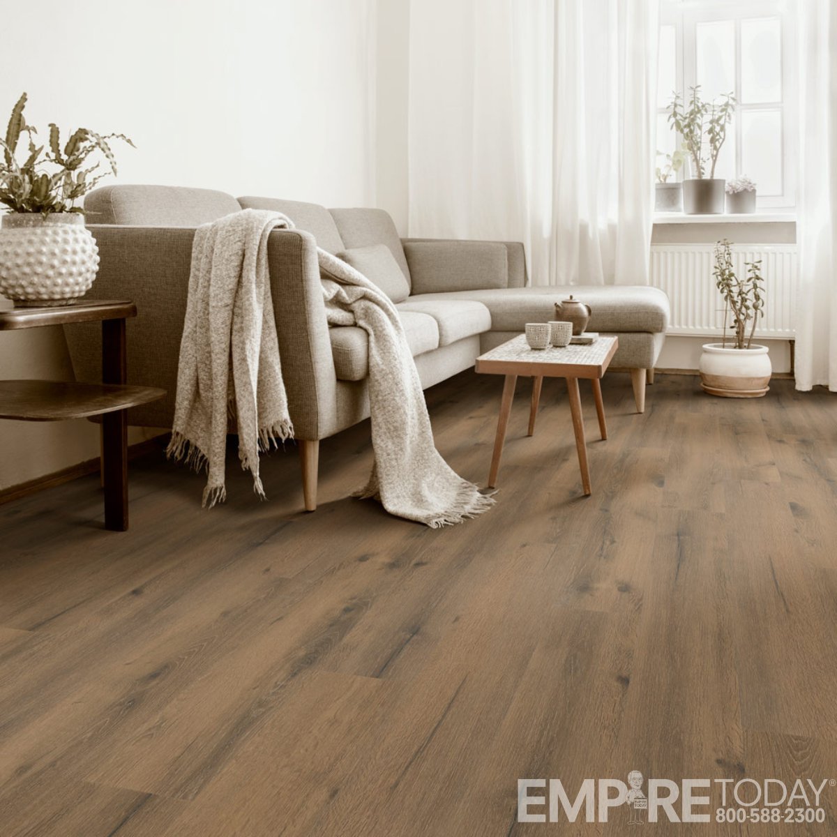 Style meets serenity. Engleton wood-look vinyl brings warmth, quiet, and comfort to your living space.

empire.today/3FLAegP

#livingroom #interiordesign #flooring #vinyl #woodlook #vinylfloors #vinylflooring #EmpireToday