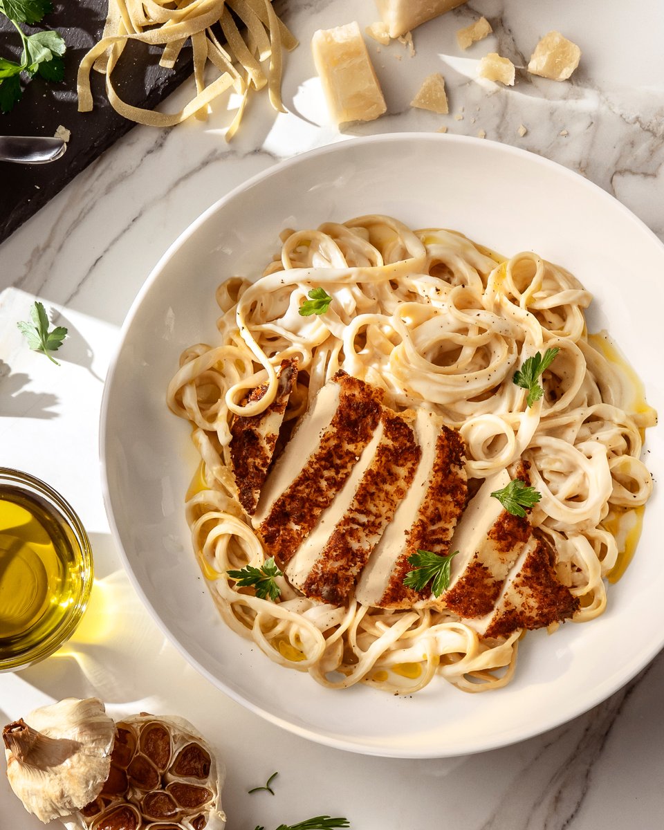 Where comfort meets craftsmanship. Indulge in the imported Pecorino Romano, house-made sauce, and artful simplicity of our Finest Fettuccine Alfredo.