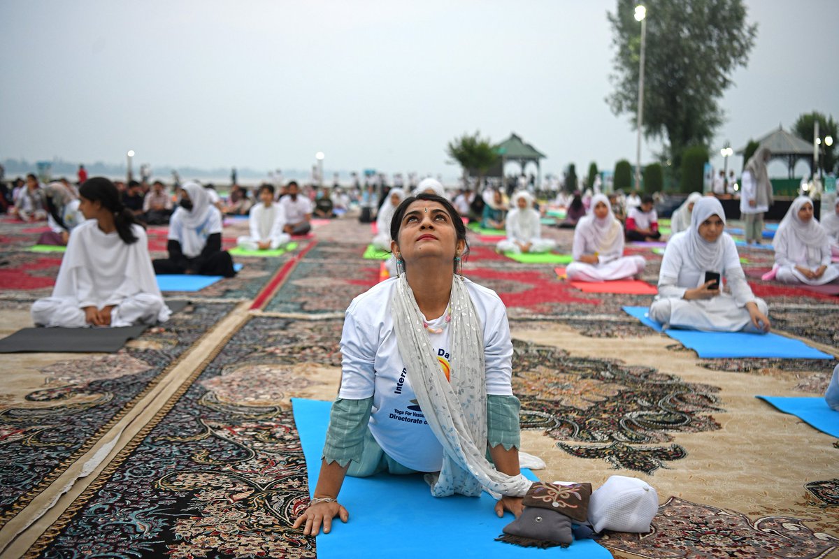 Scores of people performed yoga in Srinagar to mark the International Yoga Day