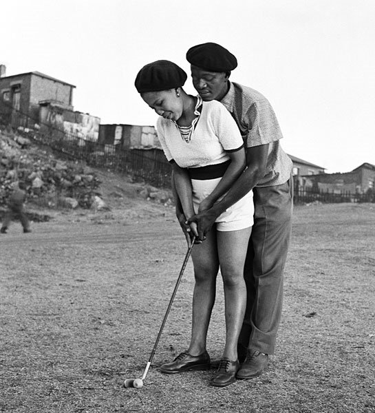 A golf lesson, Sophiatown, by Jurgen Schadeberg, 1952.