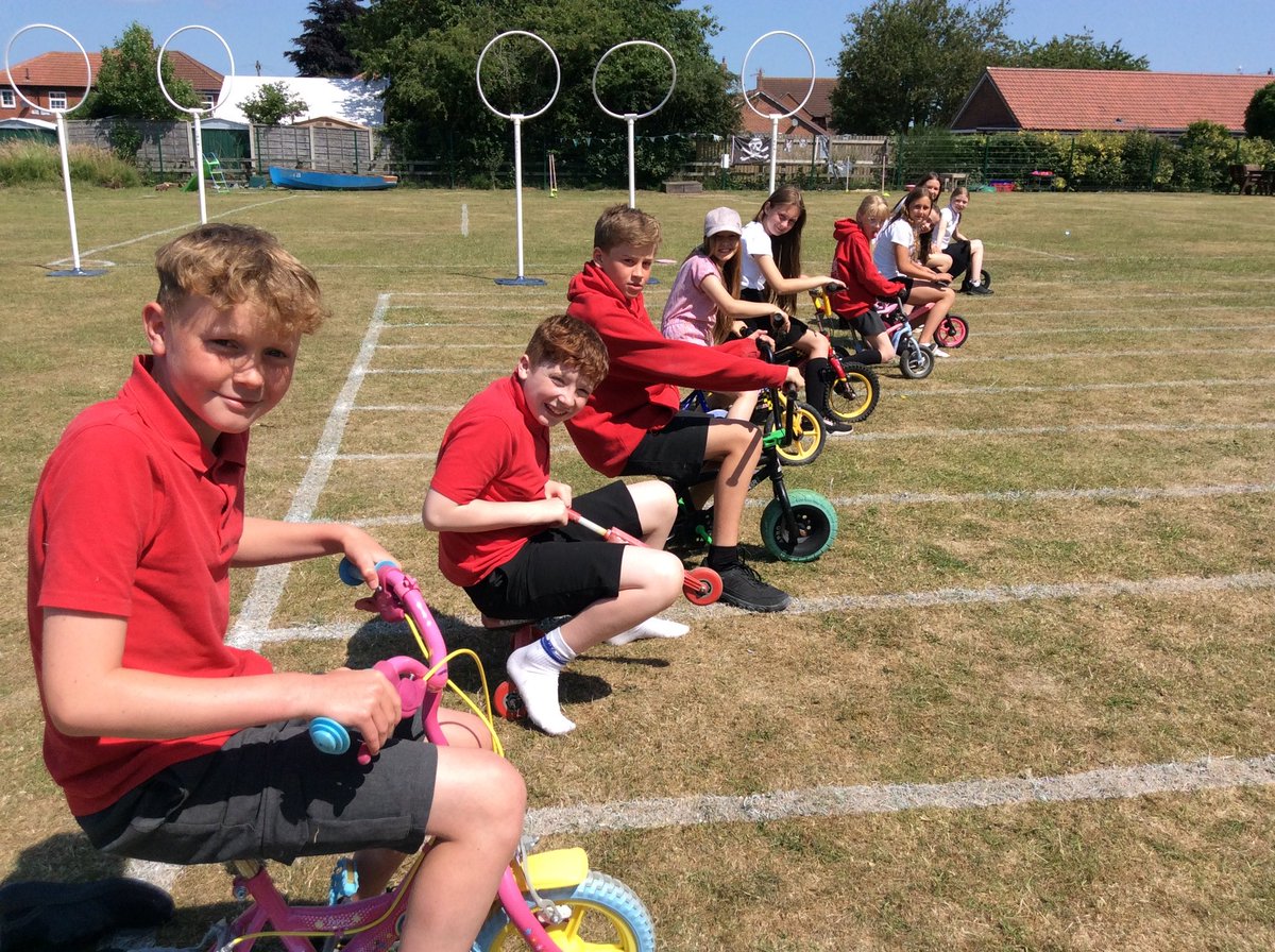 NorthDuffieldSc's tweet image. Having fun in the sun! @OPAL_CIC Wheelie race on the sports day track anyone?