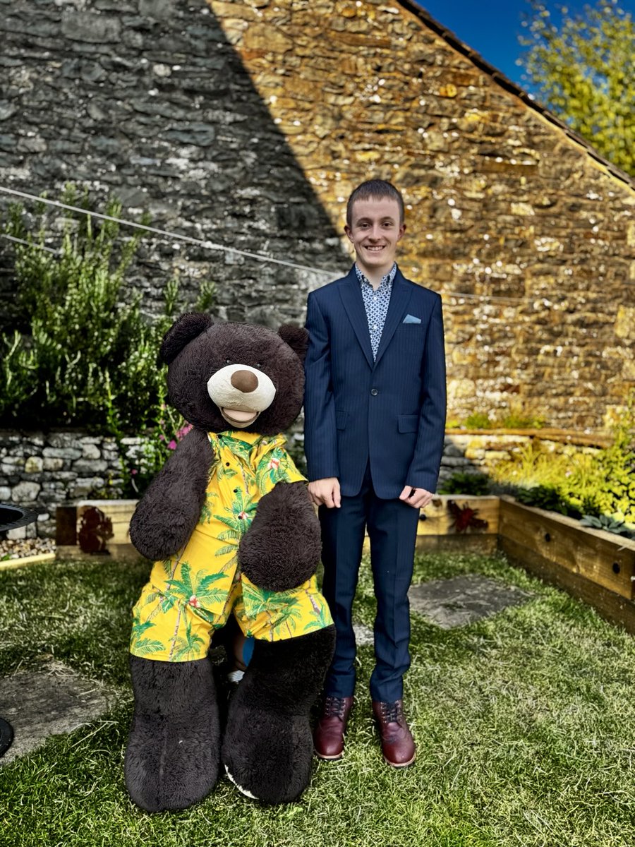 Two very well-dressed young gentlemen, one of whom is off to the school leavers’ prom. Guess which one.