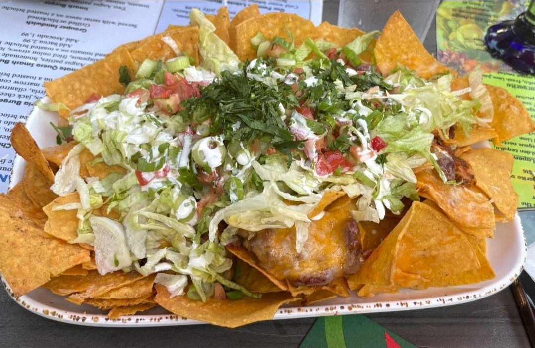 NachoJerry's tweet photo. "Fiesta #Nachos" The Hub Baja Grill. Sarasota, FL. 4/10. https://t.co/n1W3m2srVQ