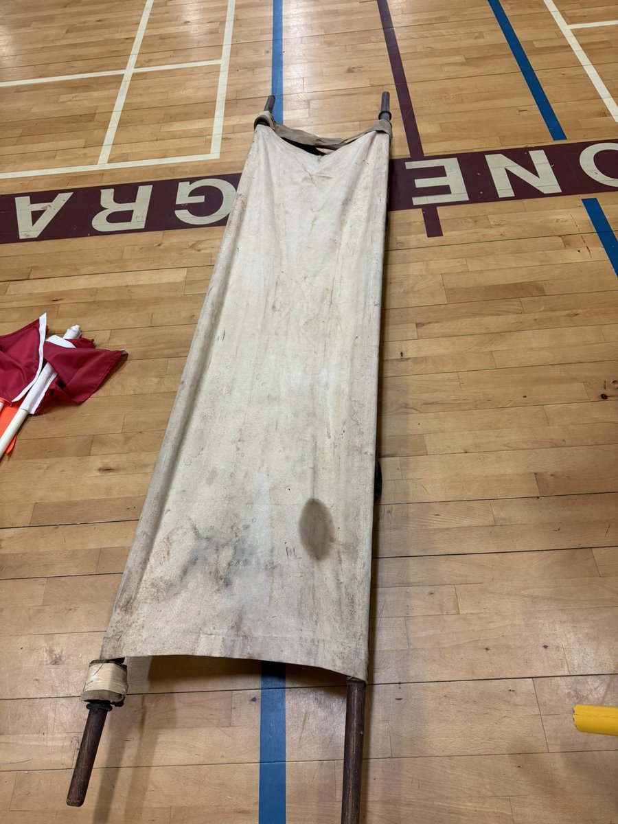 Back on the bird app to ask PEI pals if they know of anyone that may want a VERY vintage stretcher 😆 we ripped out some lockers at Colonel Gray today and it was tucked in behind- we think it’s older than the school for sure (1960’s). (Yes we think that’s blood)