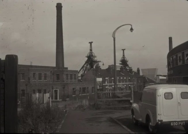 Photo from Staffordshire Past Track, taken from outside The Golden Cup on what was then Town Road. Anyone remember the pit chimneys coming down? I remember watching the furthest one near Hulton Street, I think it was explosive charges and it just fell over.