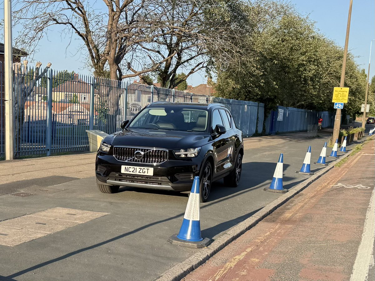 BadParkingLpool's tweet image. Take the hint.. Pavement outside a school, double yellows, big florescent no parking sign, cycle lane, row of blue cones…