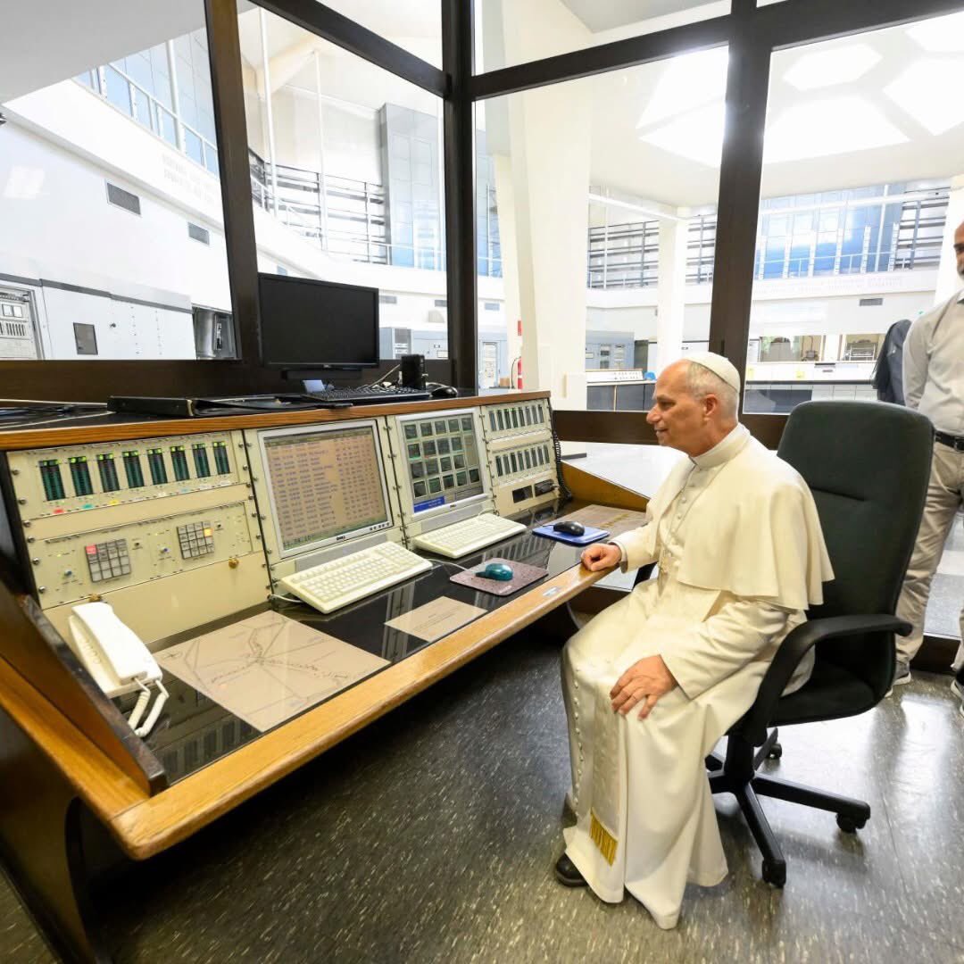 There’s something charming about the juxtaposition of a cleric wearing robes from an earlier era sitting in the midst of technology from…also an earlier era, but a notably less-earlier era