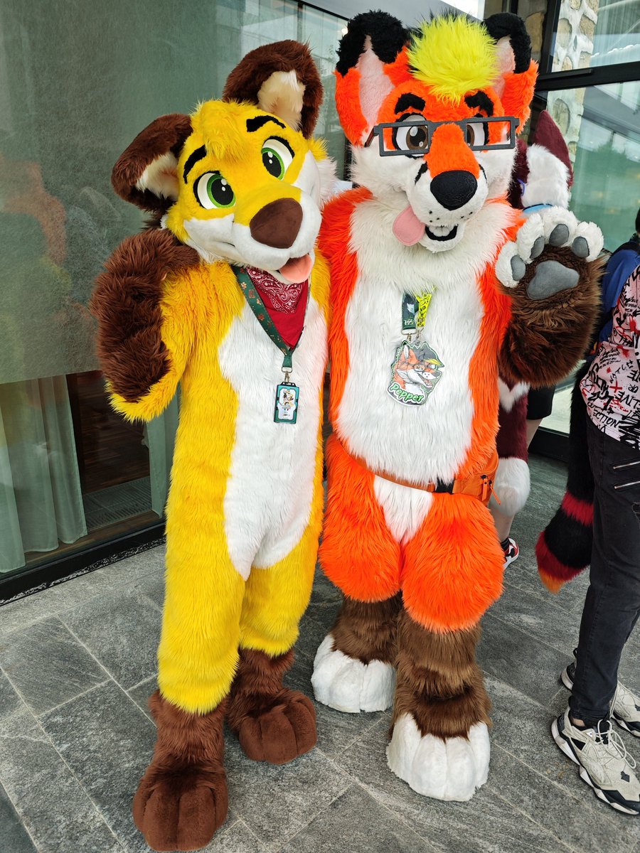 I'm happy that I got to meet the adorable yellow fluff <a href="/NicoFoxie/">Nico 🔜 Awoostria</a> :3

<a href="/WesterFoxLuke/">FoxLuc</a> 

#FursuitFriday #Furizon #FurizonZenith #furry #fursuit #fursuiter #furryfandom