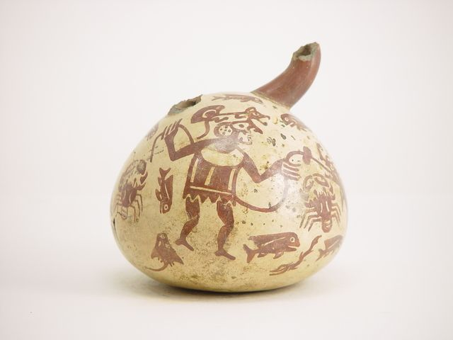 Surrounded by fishes, and other creatures of the ocean depths, because the god is underwater.

Just like the Anunnaki pictured below.
Same everywhere.