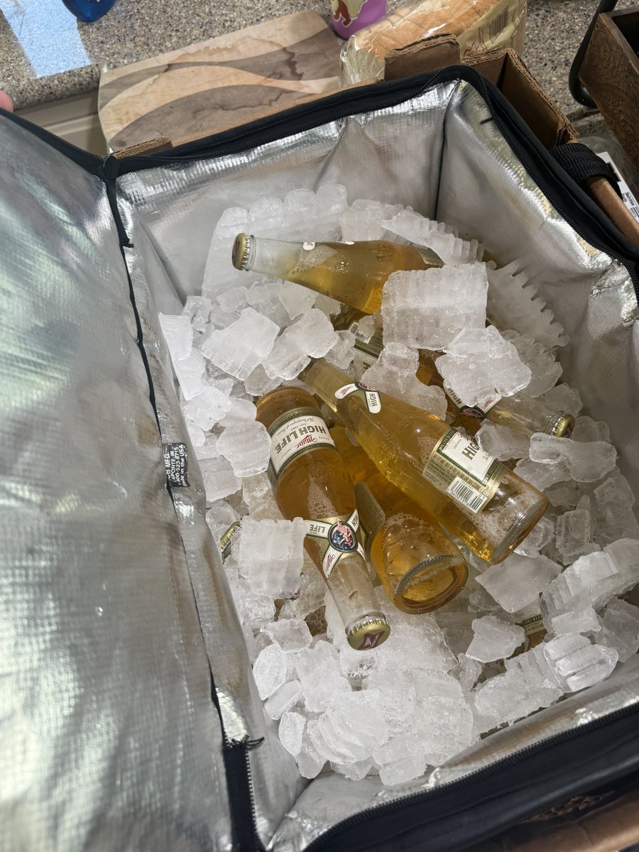 My dad shows up to the function with his own cooler of miller high life. What a G