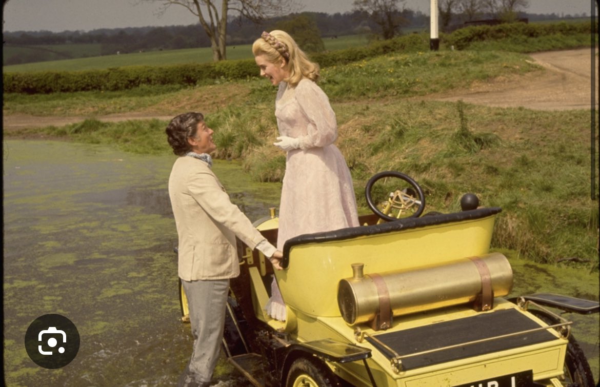 btw this was a chitty chitty bang bang reference. not that other movie. the outfits, the pond. it’s a pretty big plot point in the movie. he’s even carrying blueprints (the man is an inventor). truly (the woman) finds him immature. fits manchild perfectly.