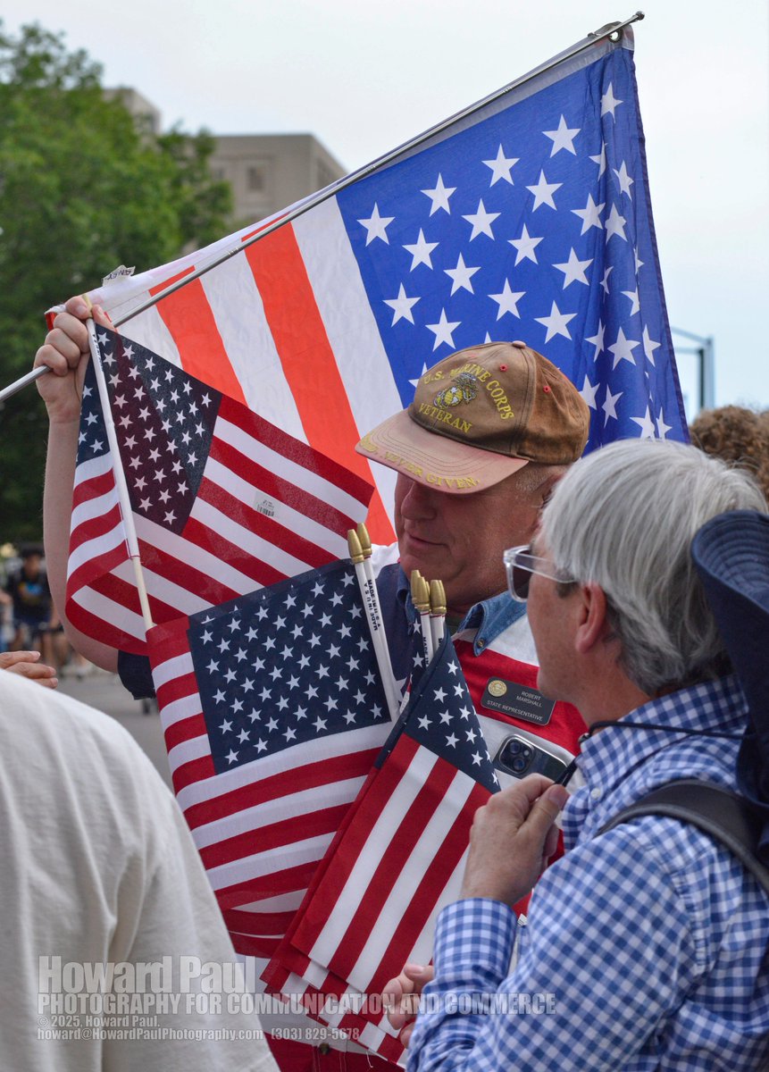 Bob4Colorado's tweet image. Had a photographer send me this who caught it at the state capitol protests last week. (I'm notoriously bad at getting photos). The ten flags I brought were snatched up quick by the crowd. Couple young Latino teenagers took one to take pictures with their sign: "Immigrants…