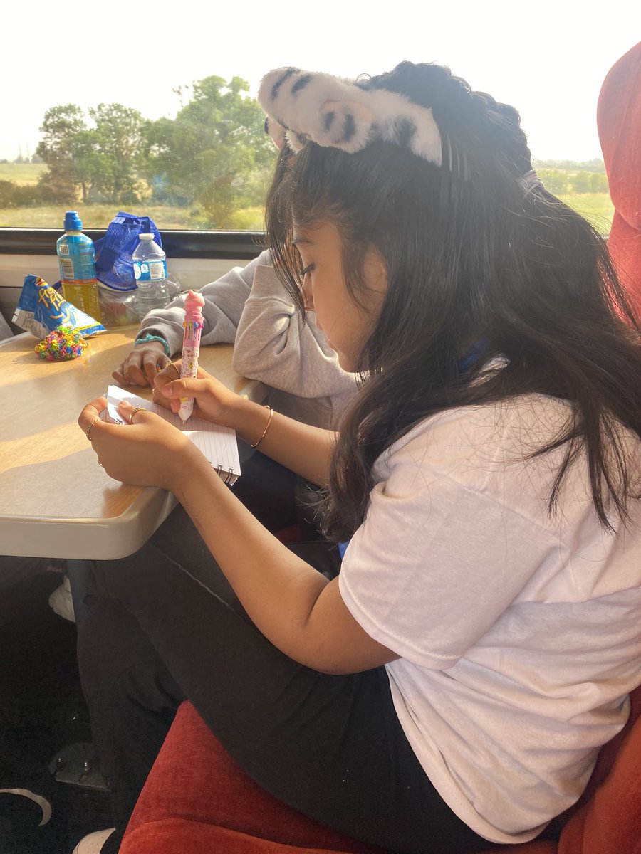 Rachel Saunders (@mrsrlsaunders) on Twitter photo I’ve just caught one of our winning pupils writing her own poetry on the train to #CLiPPA. This just shows the influence that these types of competitions can have on pupils’ motivation to read and write. <a href="/clpe1/">CLPE</a> <a href="/DarrenM1974/">Darren Matthews</a> <a href="/MiriamLordPAT/">Miriam Lord Primary School</a> <a href="/OpenUni_RfP/">Reading for Pleasure 🧶</a> <a href="/TeresaCremin/">Teresa Cremin</a> <a href="/MLBookshop/">Miriam Lord Bookshop</a> I’ve just caught one of our winning pupils writing her own poetry on the train to #CLiPPA. This just shows the influence that these types of competitions can have on pupils’ motivation to read and write. <a href="/clpe1/">CLPE</a> <a href="/DarrenM1974/">Darren Matthews</a> <a href="/MiriamLordPAT/">Miriam Lord Primary School</a> <a href="/OpenUni_RfP/">Reading for Pleasure 🧶</a> <a href="/TeresaCremin/">Teresa Cremin</a> <a href="/MLBookshop/">Miriam Lord Bookshop</a>