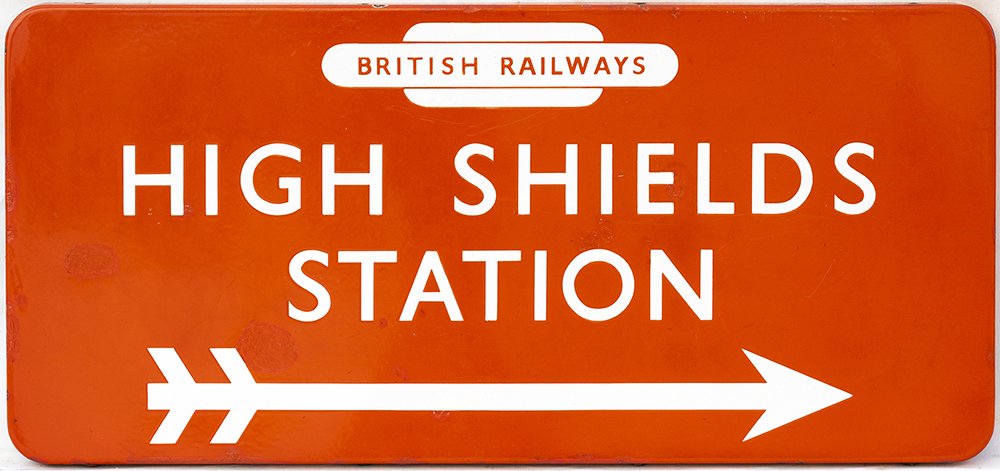 robertneuk's tweet image. At auction, an enamel station direction sign HIGH SHIELDS STATION with British Railways totem and right facing arrow. From the former North Eastern Railway station between Newcastle and South Shields. 28" x 13".
The station closed in June 1981.
Image: G.W. Railwayana Auctions