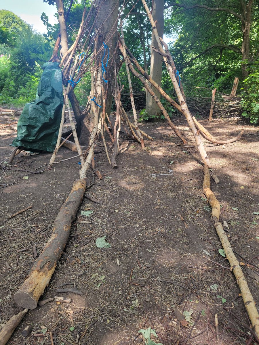 Den 4
 Features a seat, camp fire, path way and a trip wire ...