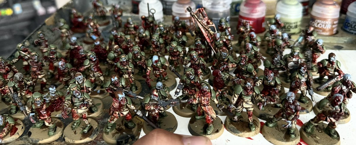 husker04's tweet photo. 6 nights of solid work and thats another 65 cadian zombies converted and painted (not based) for a grand total of 120 zombies :) now just to do the undead ultramarines… #WarhammerCommunity #warcom #warhammer #warhammer40k #warhammer40000 #zombies #undead #nurgle #plaguemarines https://t.co/d5NTFvURFW