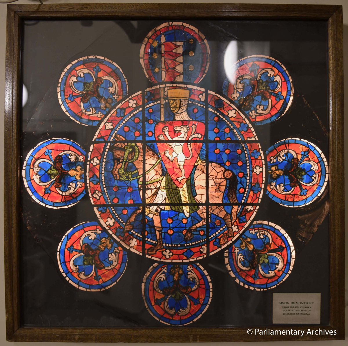 Parliament Archives (@ukparlarchives) on Twitter photo This is a piece of dual parliamentary history, it is a replica stained glass window depicting Simon de Montfort, who called the first parliament in 1265. This replica was used in a past parliamentary exhibition from 1965 to mark the 700th anniversary. This year marks 760 years! This is a piece of dual parliamentary history, it is a replica stained glass window depicting Simon de Montfort, who called the first parliament in 1265. This replica was used in a past parliamentary exhibition from 1965 to mark the 700th anniversary. This year marks 760 years!